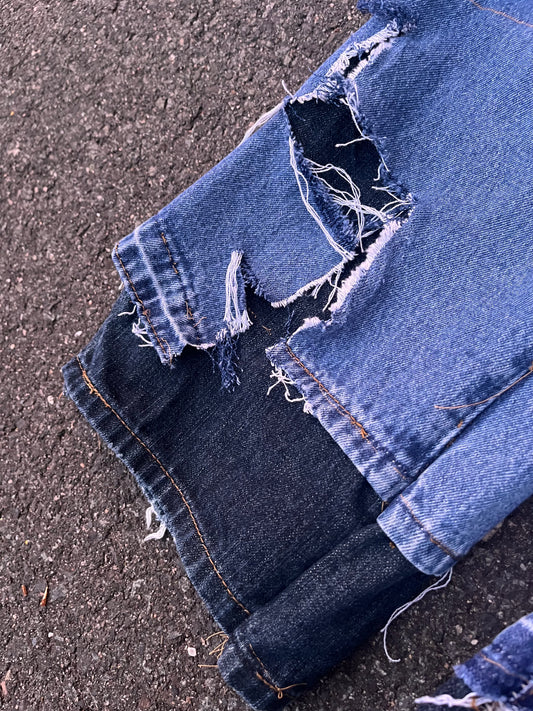 Distressed double layered jeans